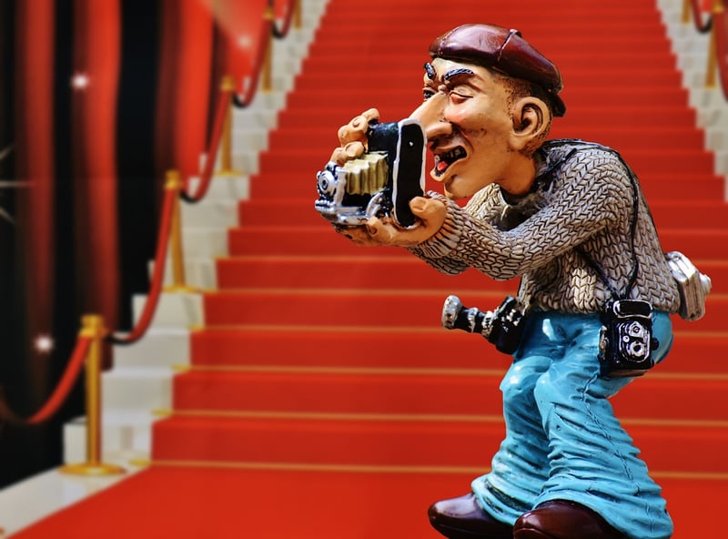 Paparazzi capturing a celebrity